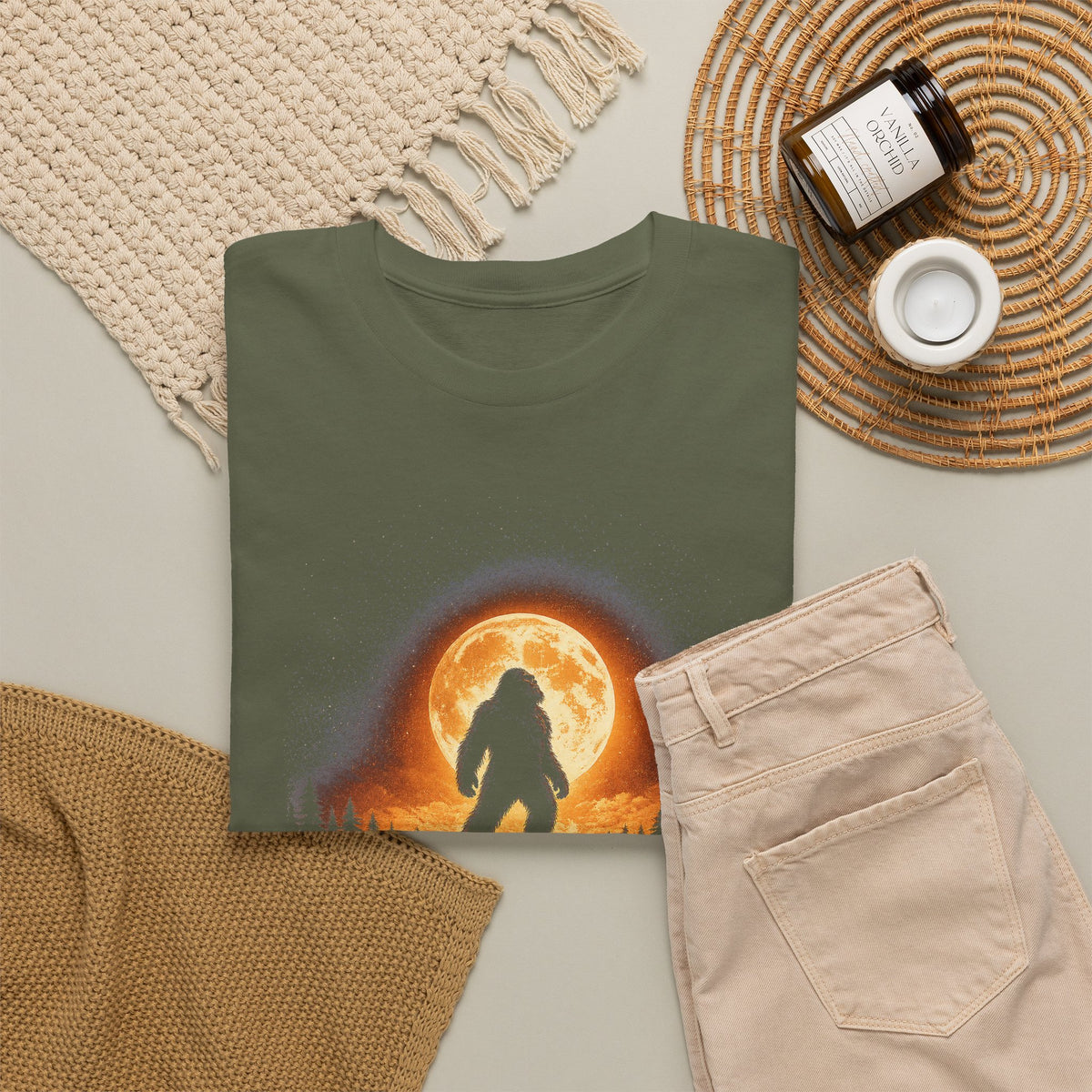 Atmospheric silhouette of a Bigfoot standing majestically in front of a glowing full moon on a hilltop T-Shirt - Atmospheric Gradient Sky Graphic Tee