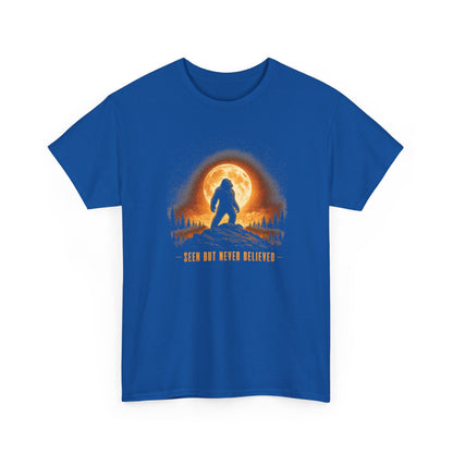 Atmospheric silhouette of a Bigfoot standing majestically in front of a glowing full moon on a hilltop T-Shirt - Atmospheric Gradient Sky Graphic Tee