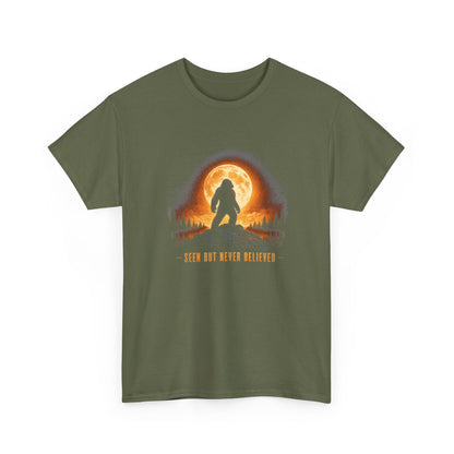 Atmospheric silhouette of a Bigfoot standing majestically in front of a glowing full moon on a hilltop T-Shirt - Atmospheric Gradient Sky Graphic Tee