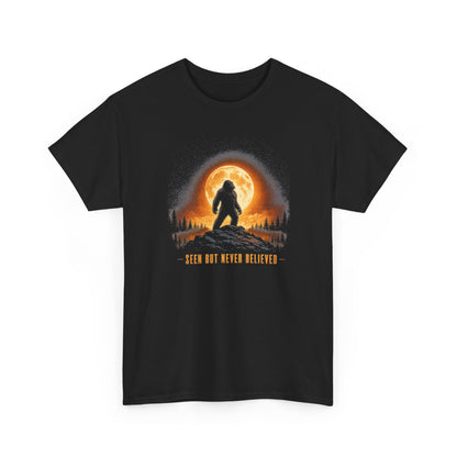 Atmospheric silhouette of a Bigfoot standing majestically in front of a glowing full moon on a hilltop T-Shirt - Atmospheric Gradient Sky Graphic Tee