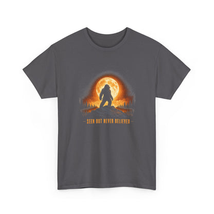 Atmospheric silhouette of a Bigfoot standing majestically in front of a glowing full moon on a hilltop T-Shirt - Atmospheric Gradient Sky Graphic Tee
