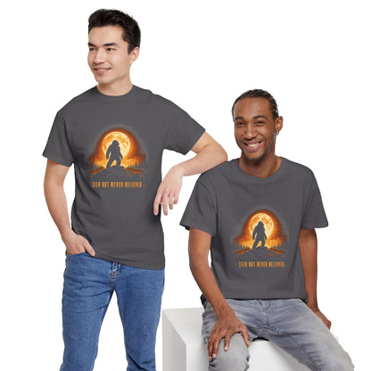Atmospheric silhouette of a Bigfoot standing majestically in front of a glowing full moon on a hilltop T-Shirt - Atmospheric Gradient Sky Graphic Tee